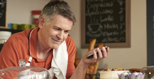 man using wireless hearing aid