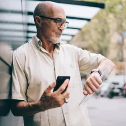 man looking at his watch