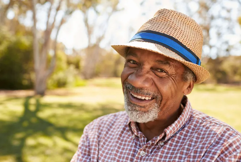 man smiling garden